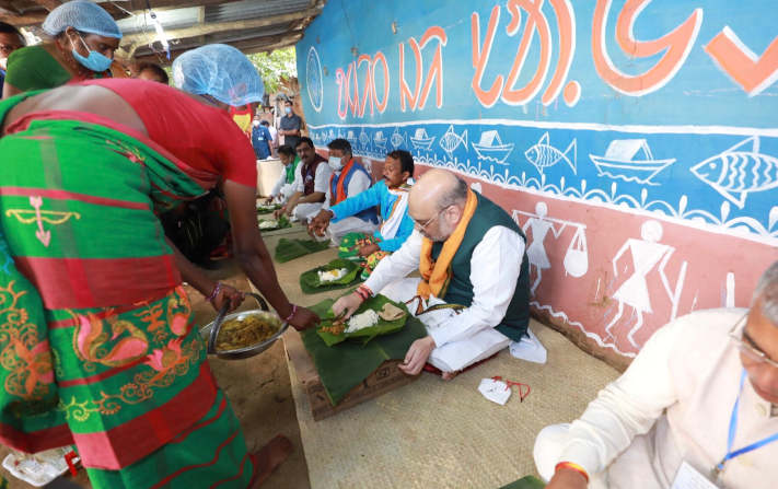 Home Minister Amit Shah having lunch at an Adivasi household in West Bengal's Bankura district