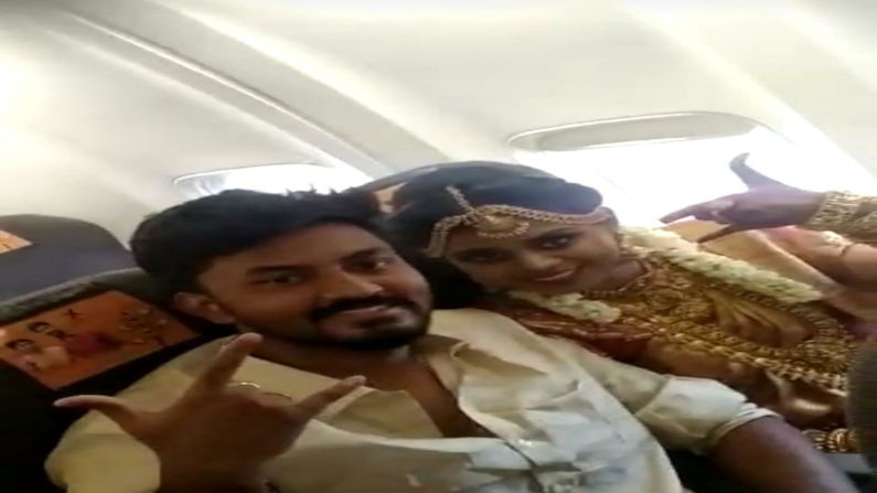 Rakesh and Dakshina posing for a picture from the plane (PC: ANI)